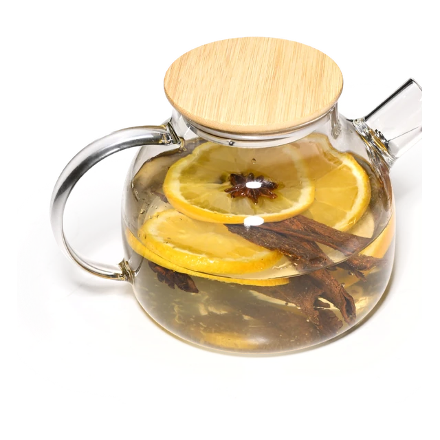A glass tea pot of cinnamon and orange infusion