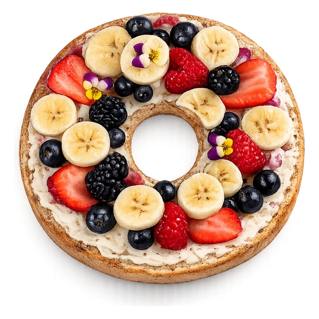 A New York bagel ringed with strawberries, bananas, blueberries and edible flowers